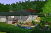 Arrière de la maison avec sa piscine biologique